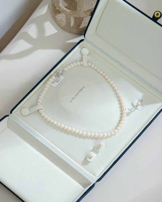 Elegant Pearl Jewelry Set with Necklace, Earrings, and Ring